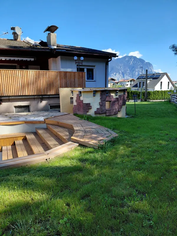 Lawn with a striking mountain behind