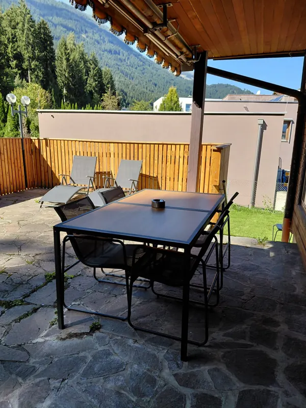 Covered dining table on the terrace